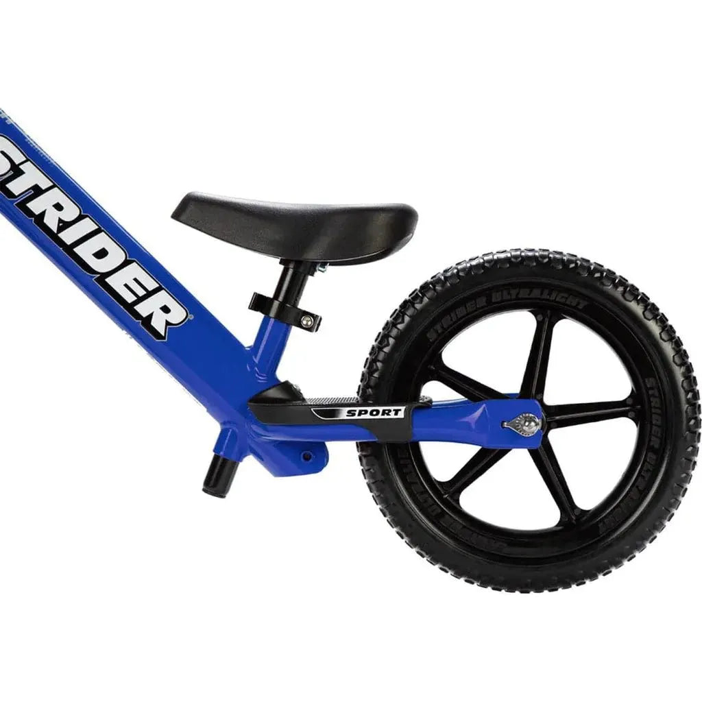 Strider Sport 12 inch Balance Bike - Blue rear wheel close up